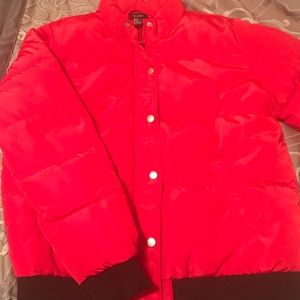 Red puffer coat.